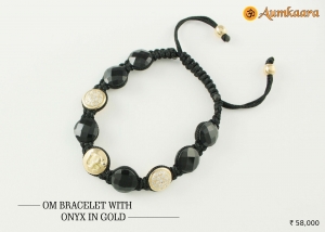 Om Bracelet with Onyx in Gold only at Rs. 58000